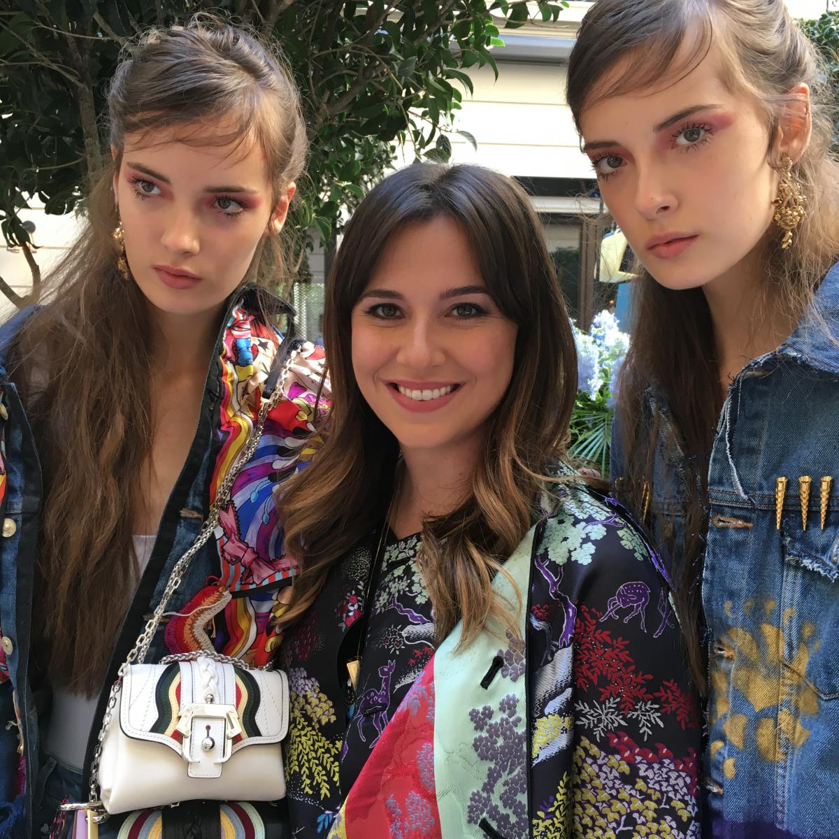 The designer Paula Cademartori in between two of her models in Milan during the ss2017 presentation